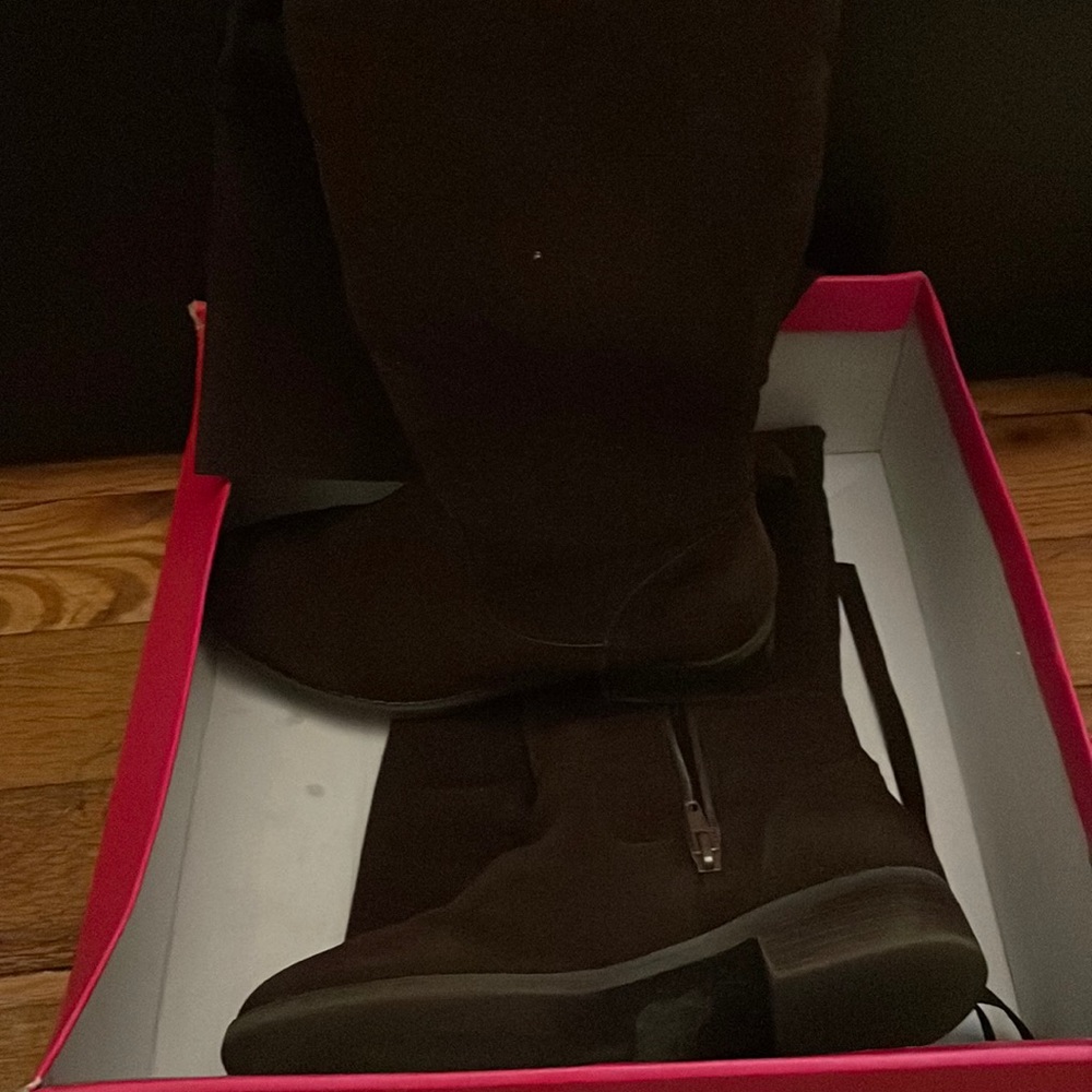 Thigh high brown boot